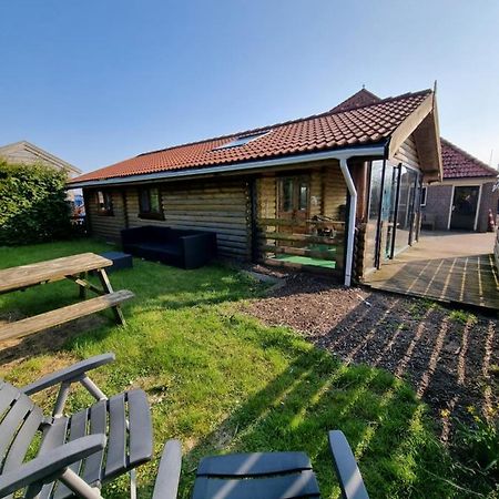 Finse Woning Op Camping De Tulpenweide Breezand Exterior foto